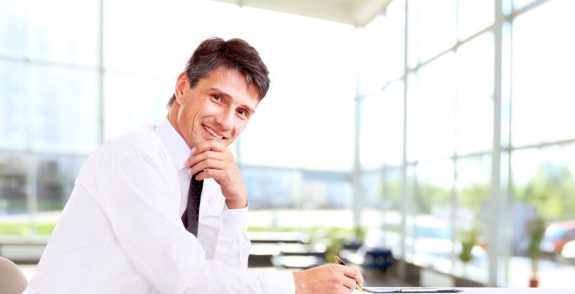 man sitting at desk