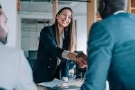 hand shake smiling woman