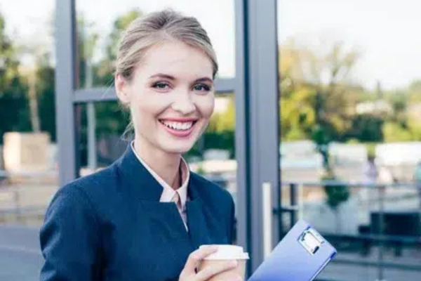 smiling woman in blue